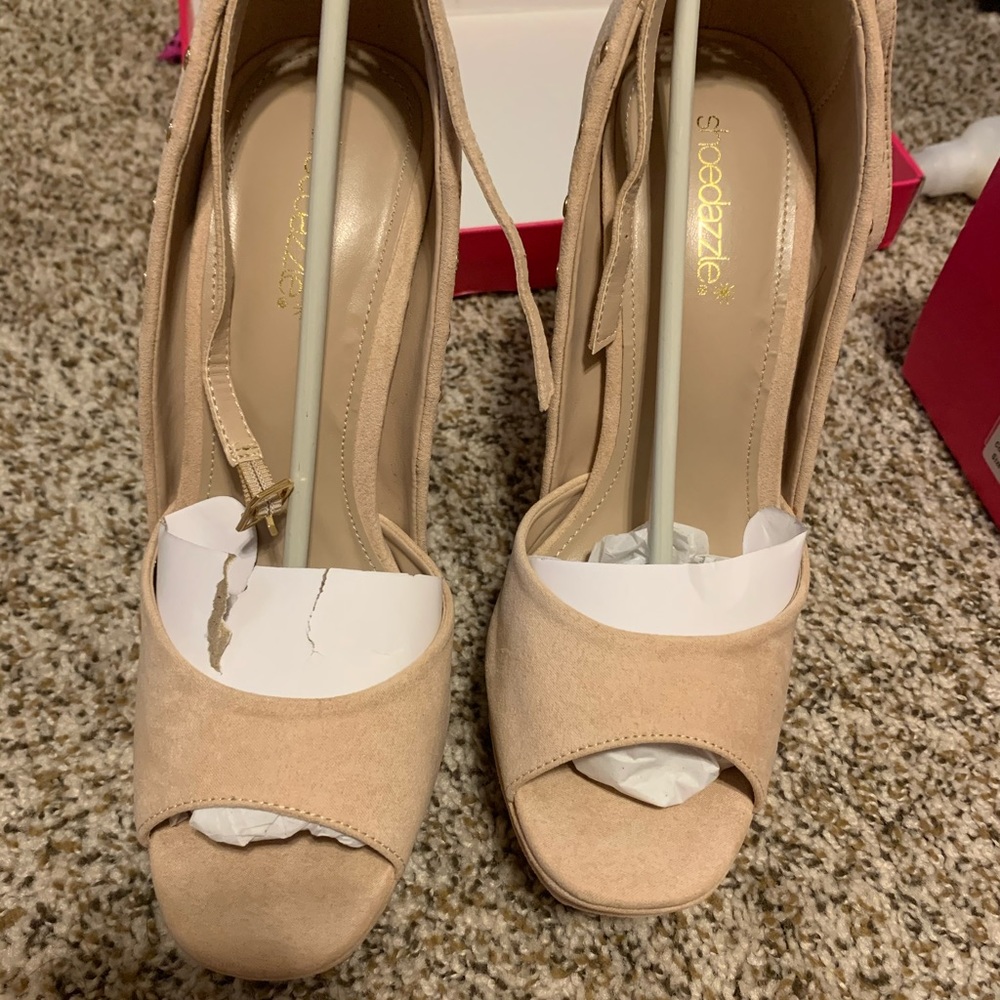 Nude studded pumps